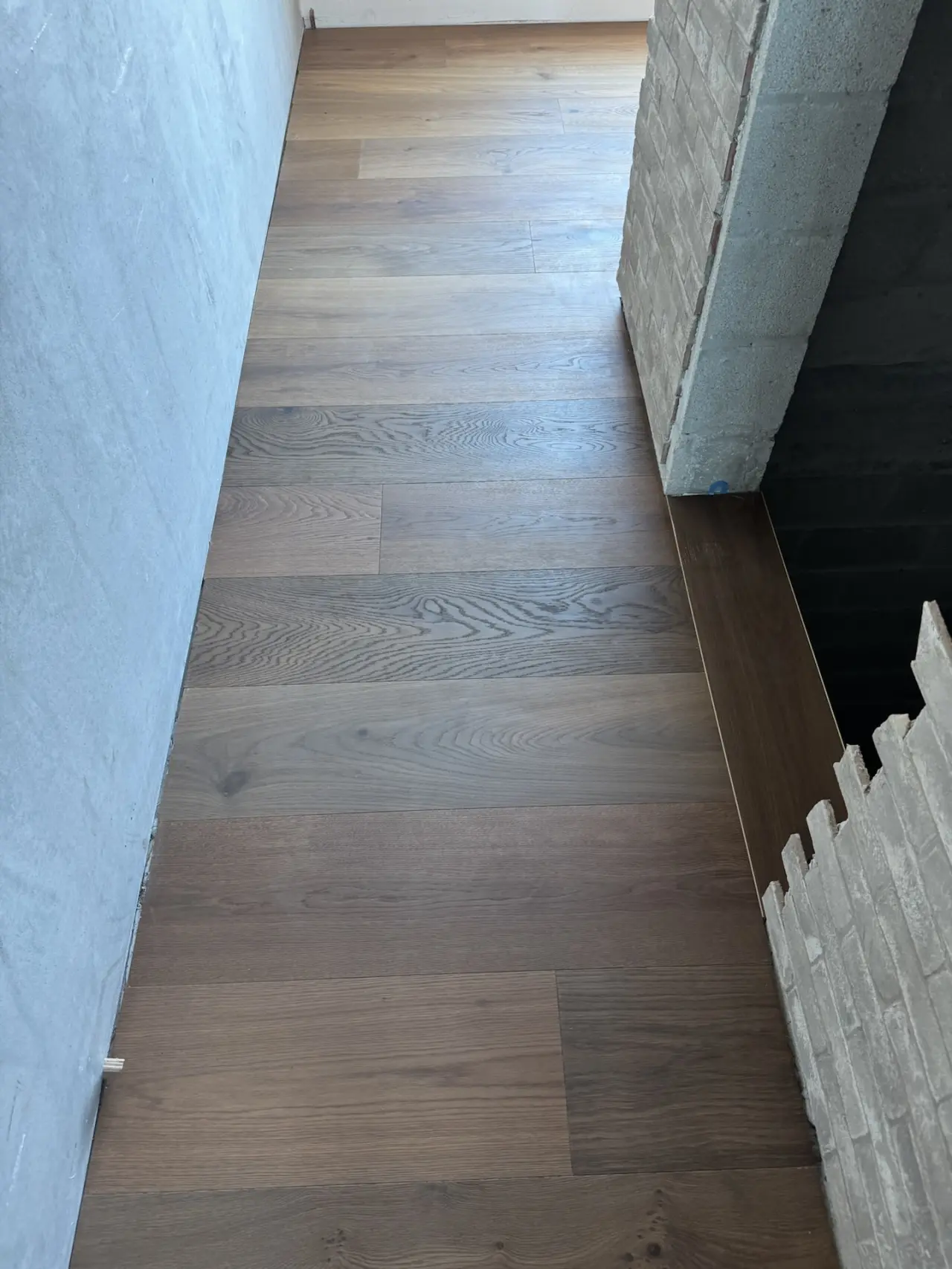 Anna Maria Island Home · Wide-plank oak, dark tone