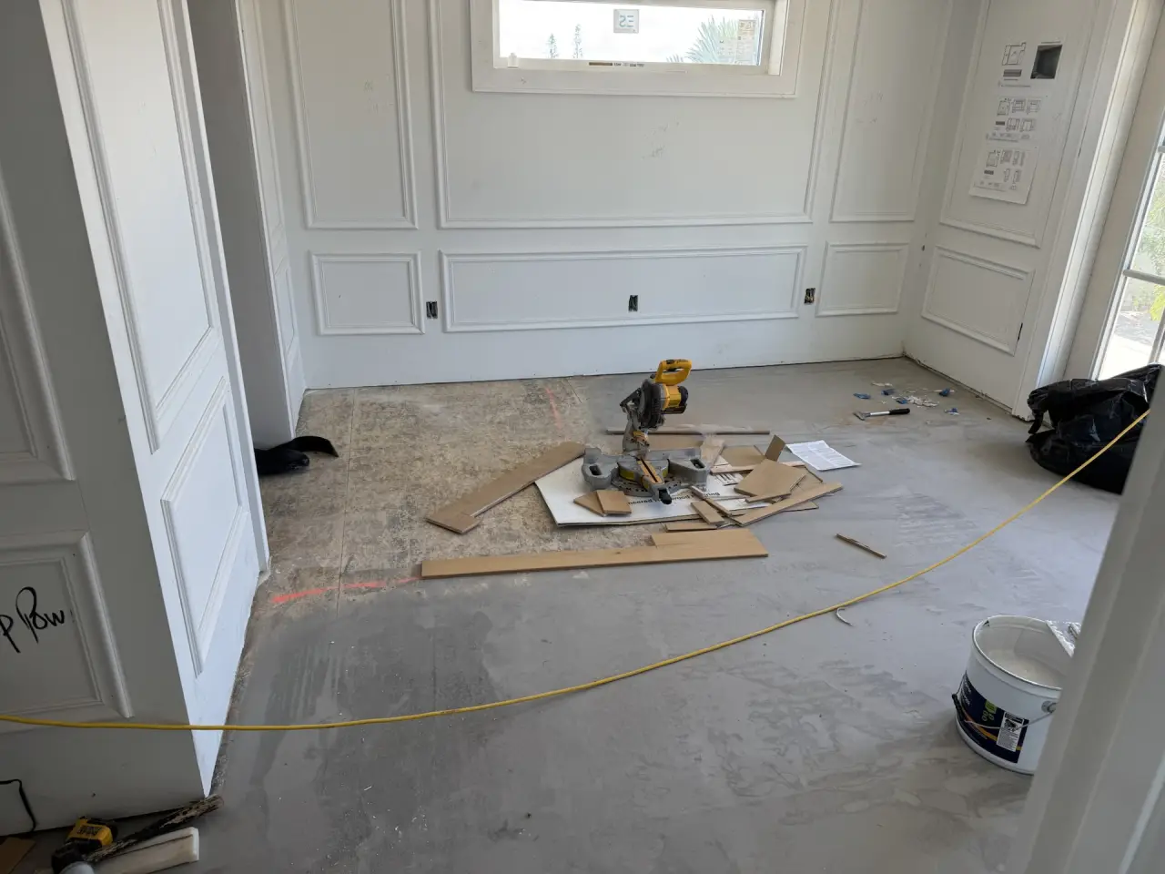 Prep · Slab checked, cleaned and marked before any plank goes down.