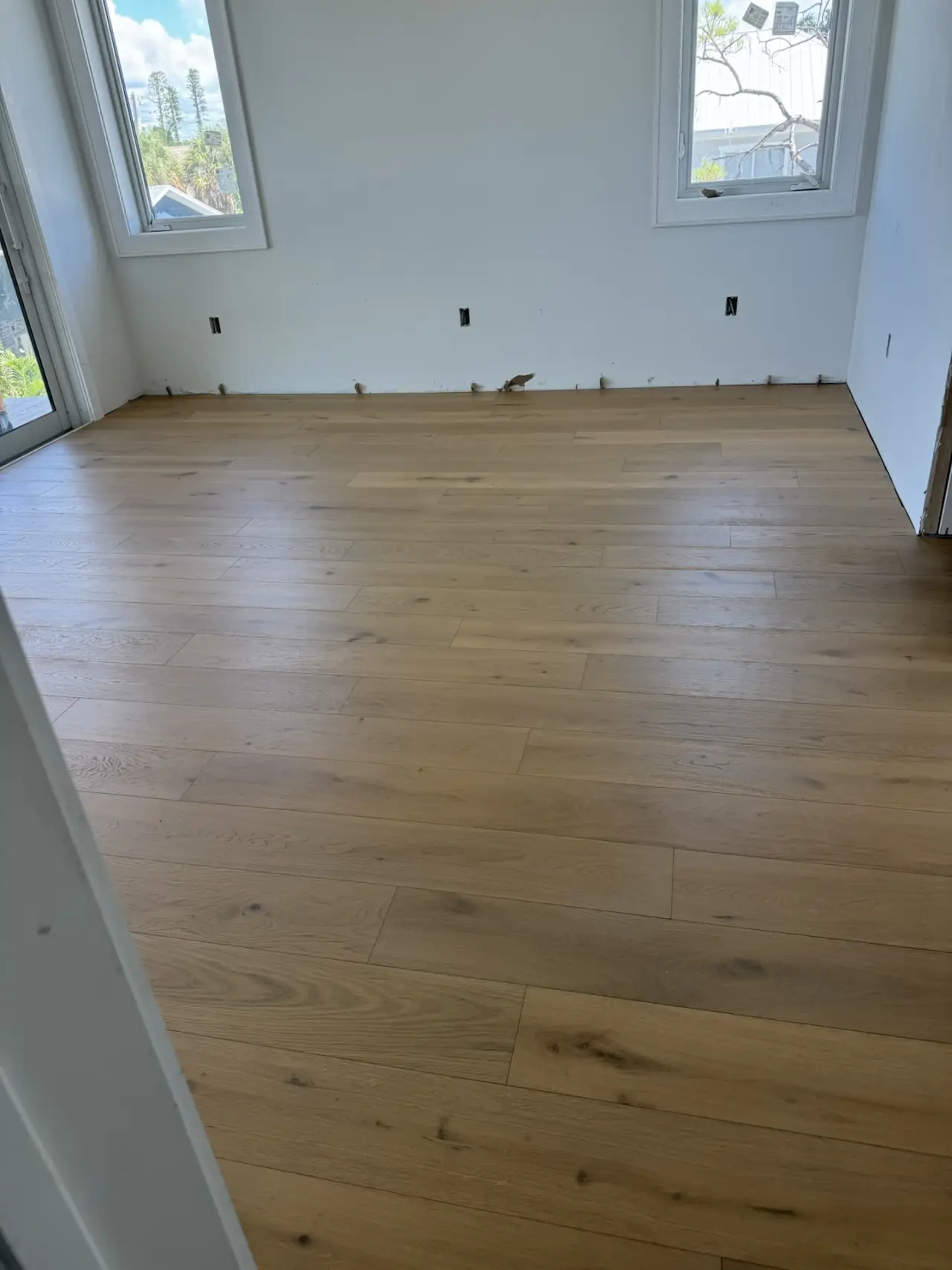 Fort Myers Residence · Wide-plank white oak