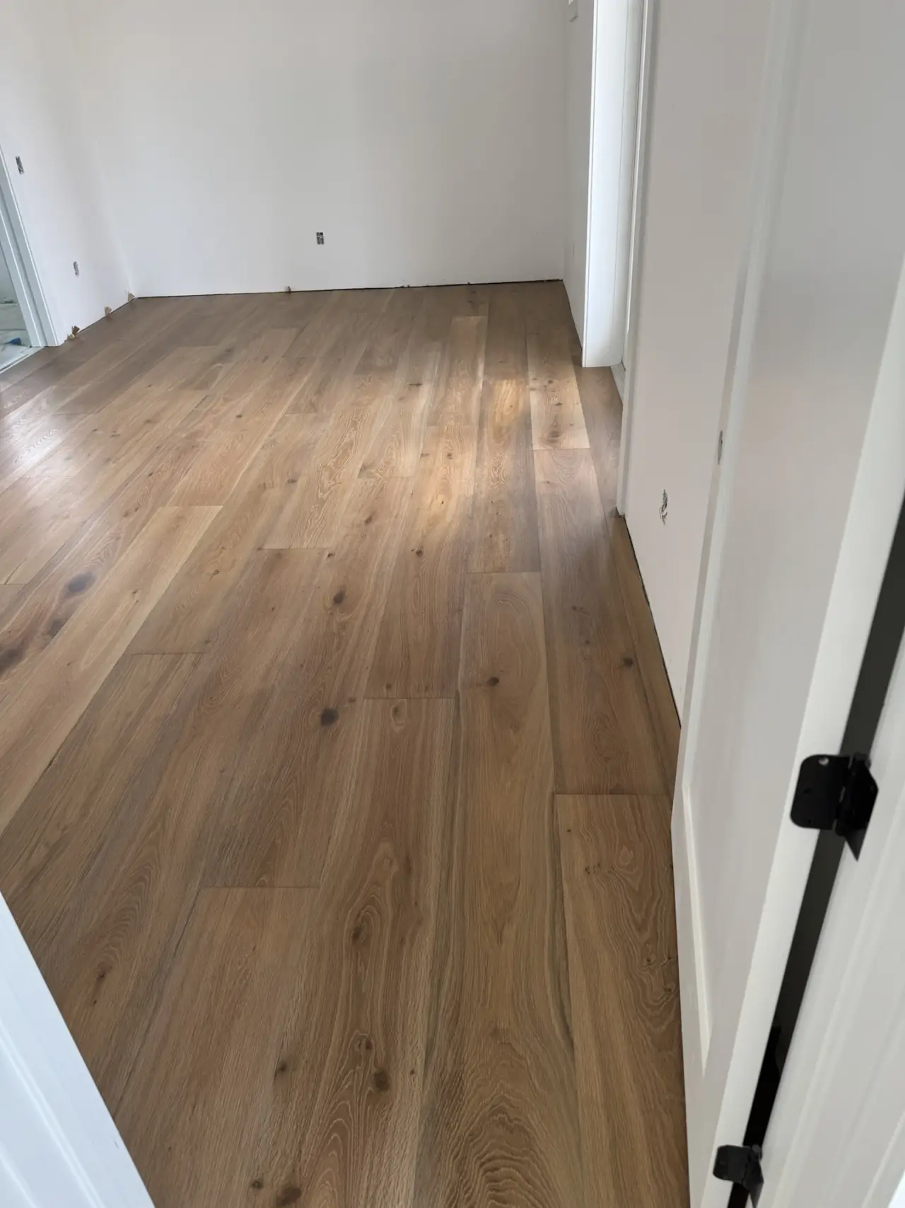 After: Bedroom · same doorway, slab to finished floor