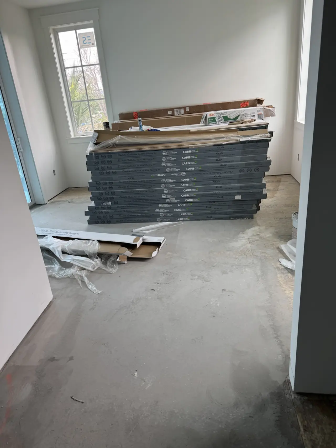 Prep · Flooring delivered and left to acclimate on site before installation.