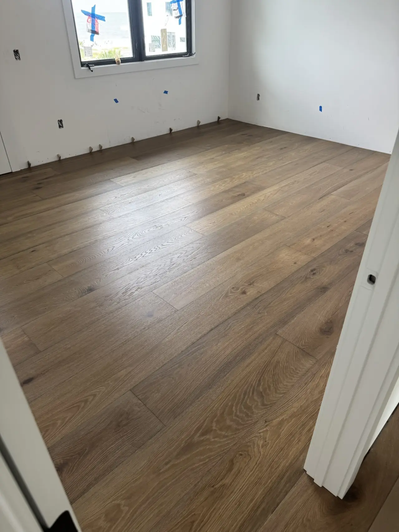 Sarasota Residence · Wide-plank oak, natural tone