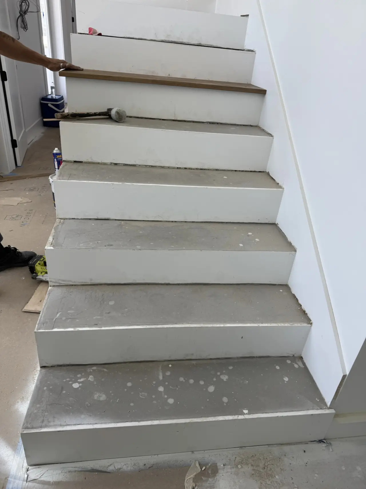 Before: Staircase · concrete steps to oak treads
