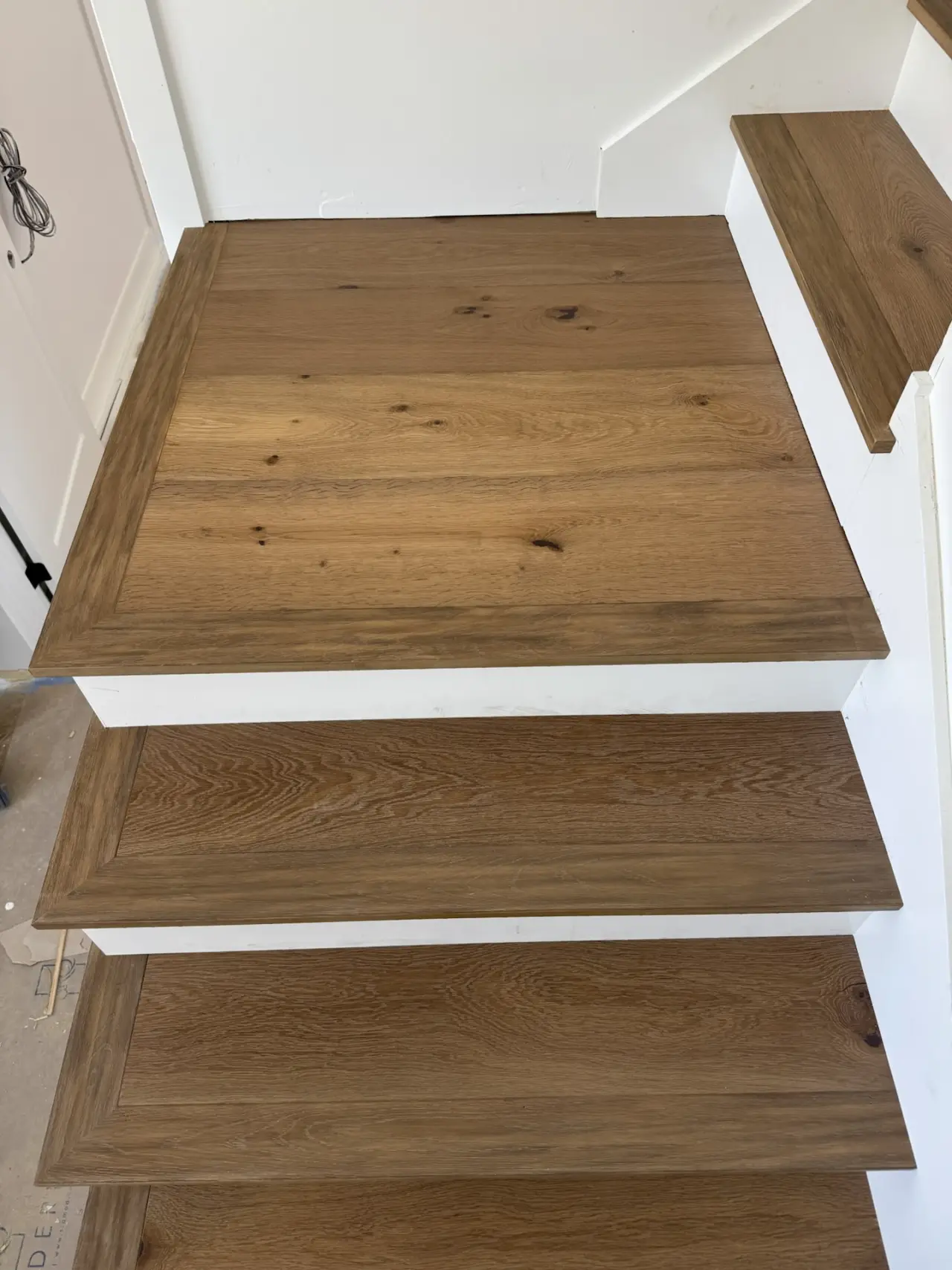 Details · Each tread cut to its own step, with a matching oak nosing.