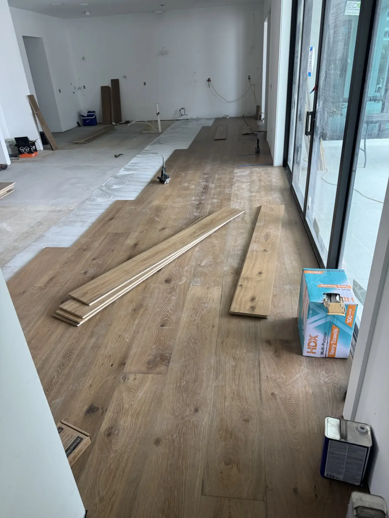 Installation · Boards racked out and laid room by room.
