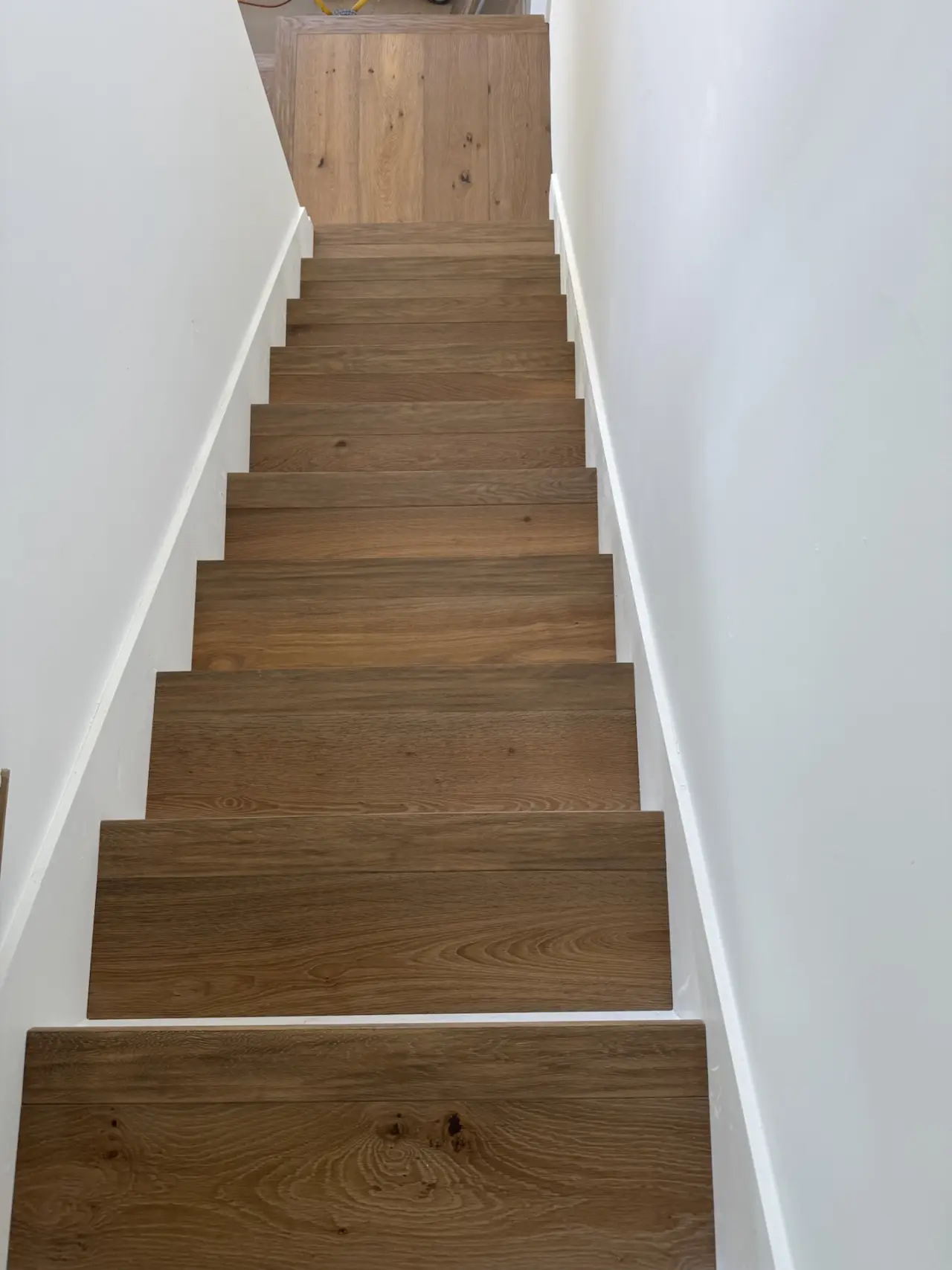 Finish · Floors and stairs in the same oak, top to bottom.