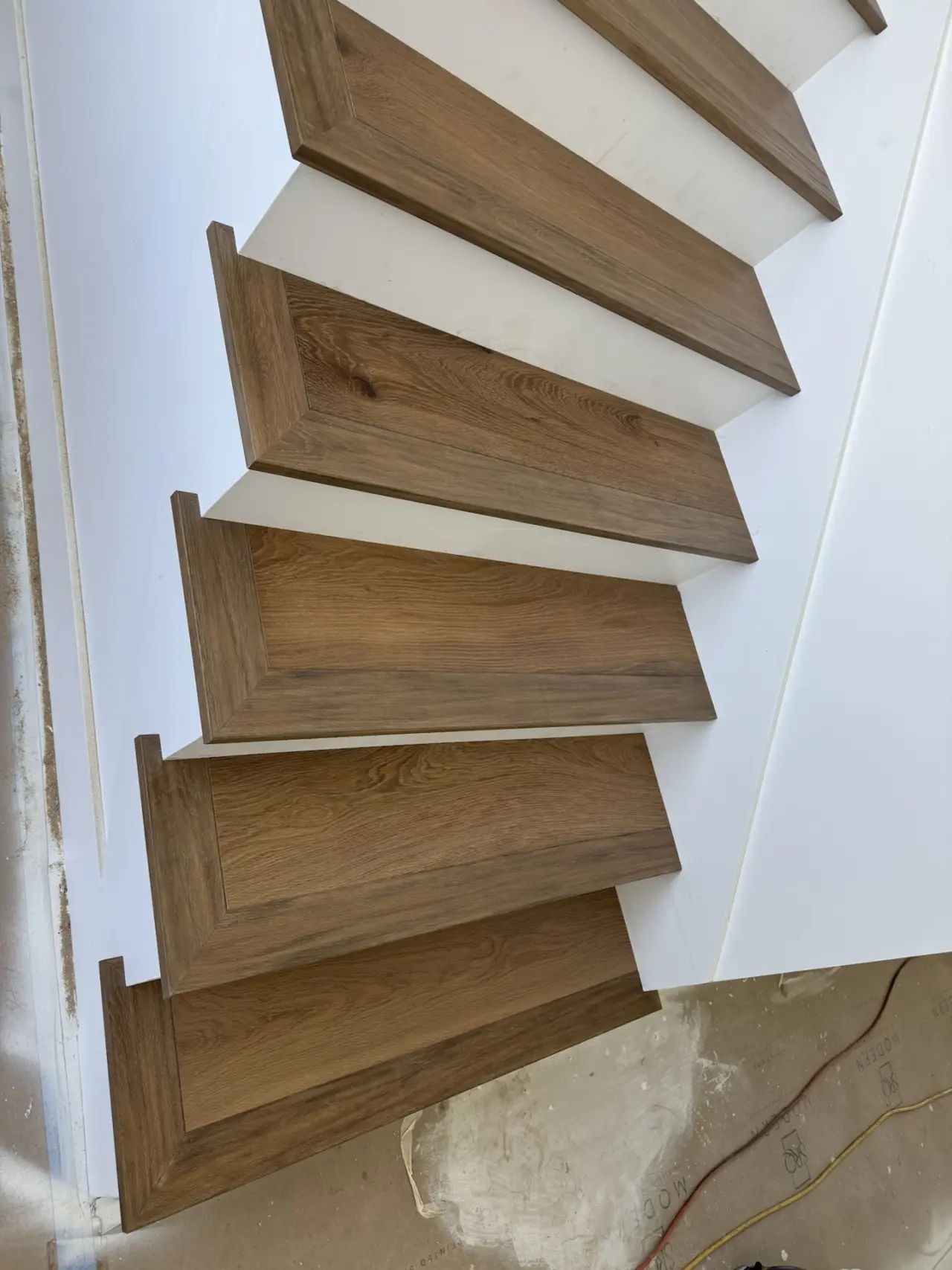 Details · Each tread cut to its own step, with a matching oak nosing.