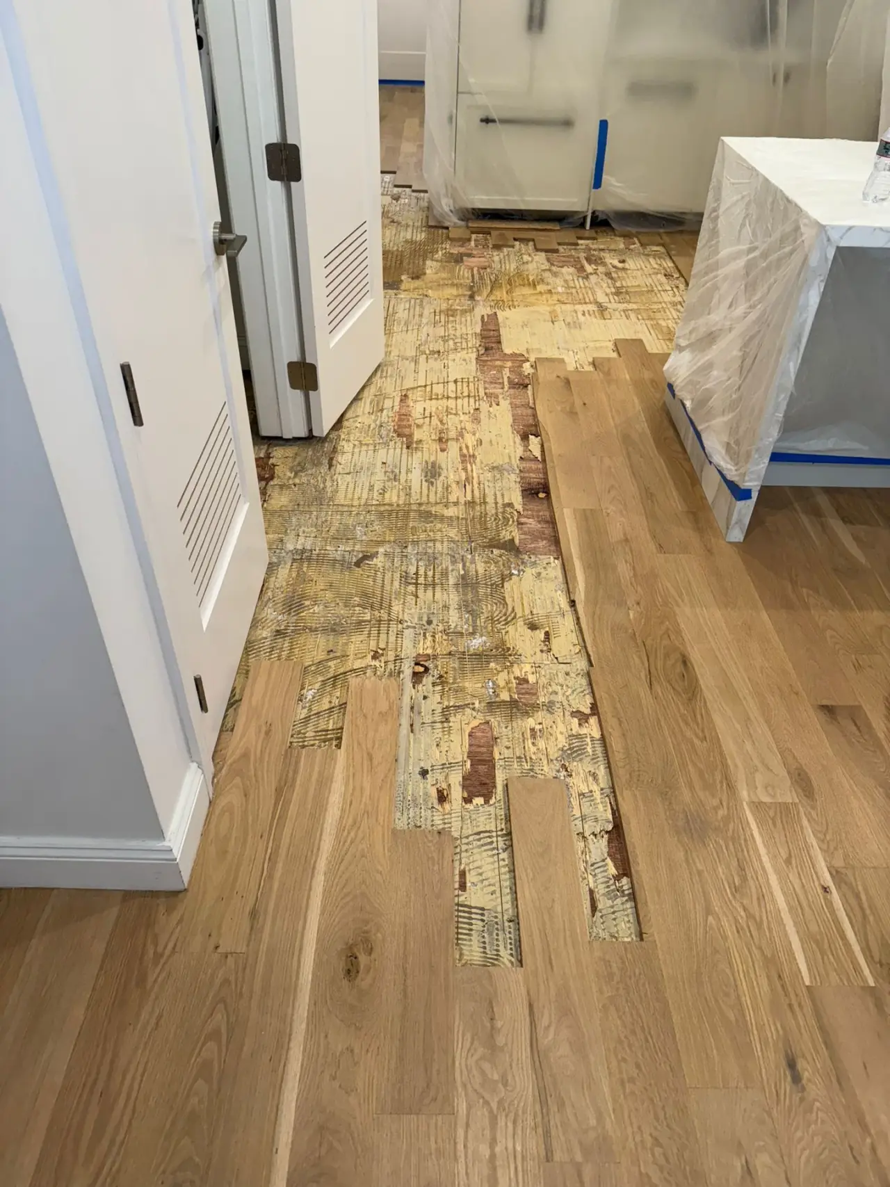 Removal · Only the damaged sections came out. The rest of the floor stayed.