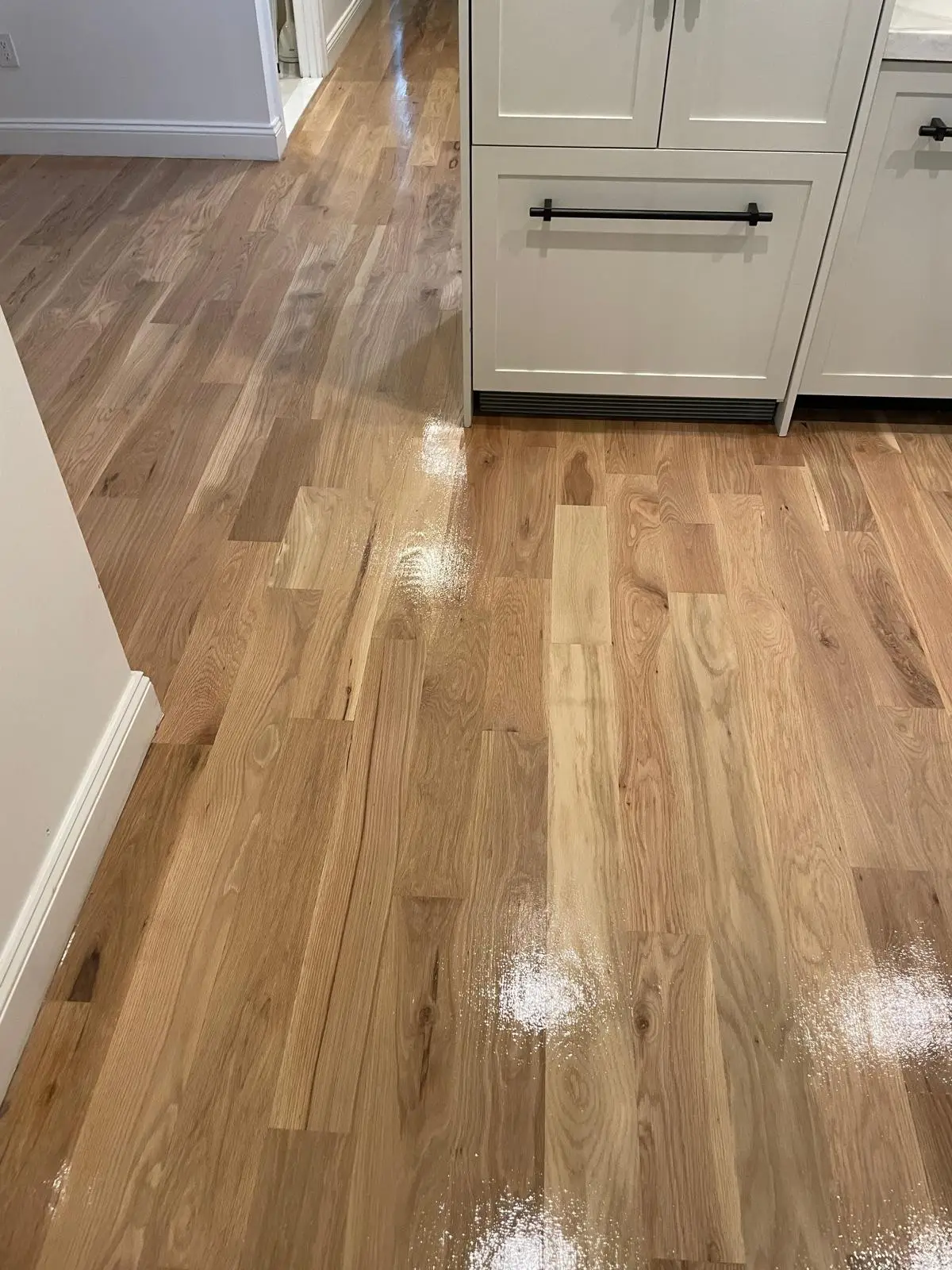 Finish · The whole floor sanded and stained as one.