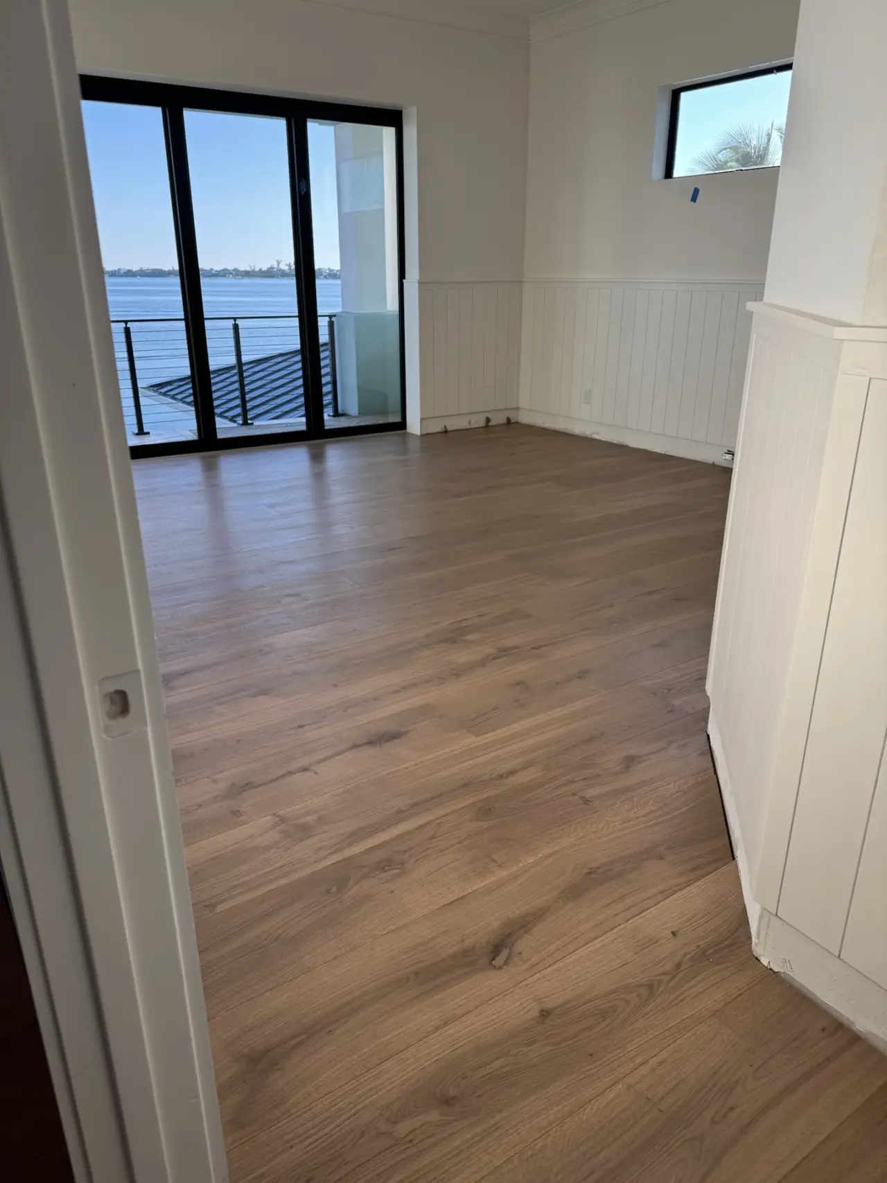 After: Doorway · prepared subfloor to finished floor